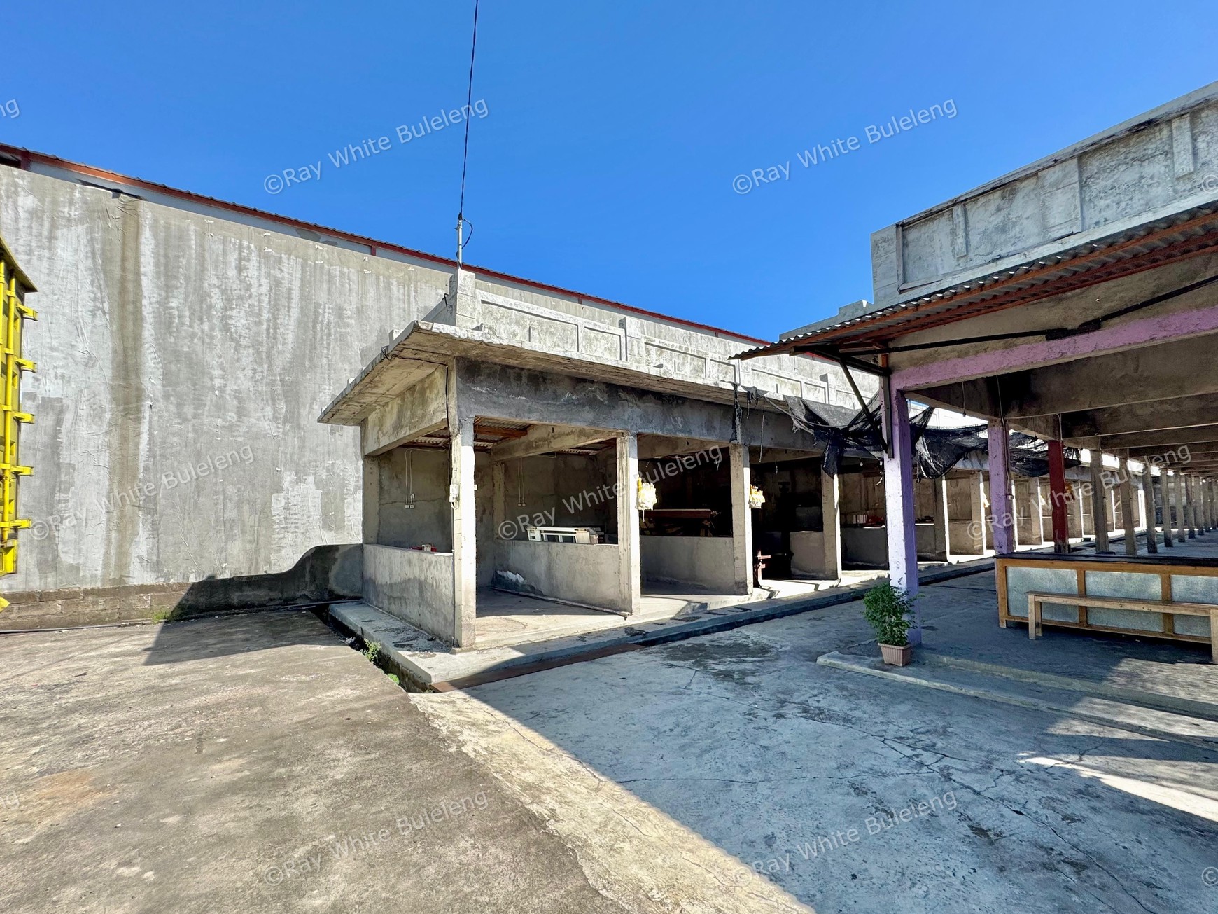 STRATEGIC COMMERCIAL PROPERTY WITH 26 SHOP UNITS ON MAIN ROAD