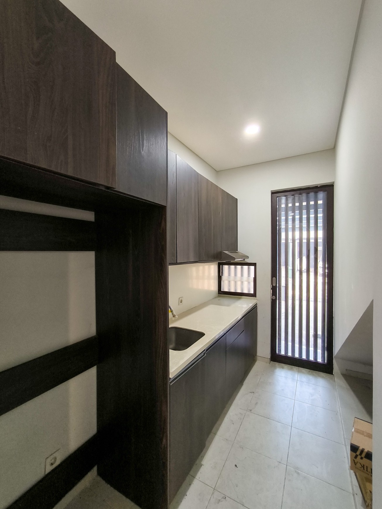 Rumah Asri dgn Smart lock system di Discovery Amore Bintaro