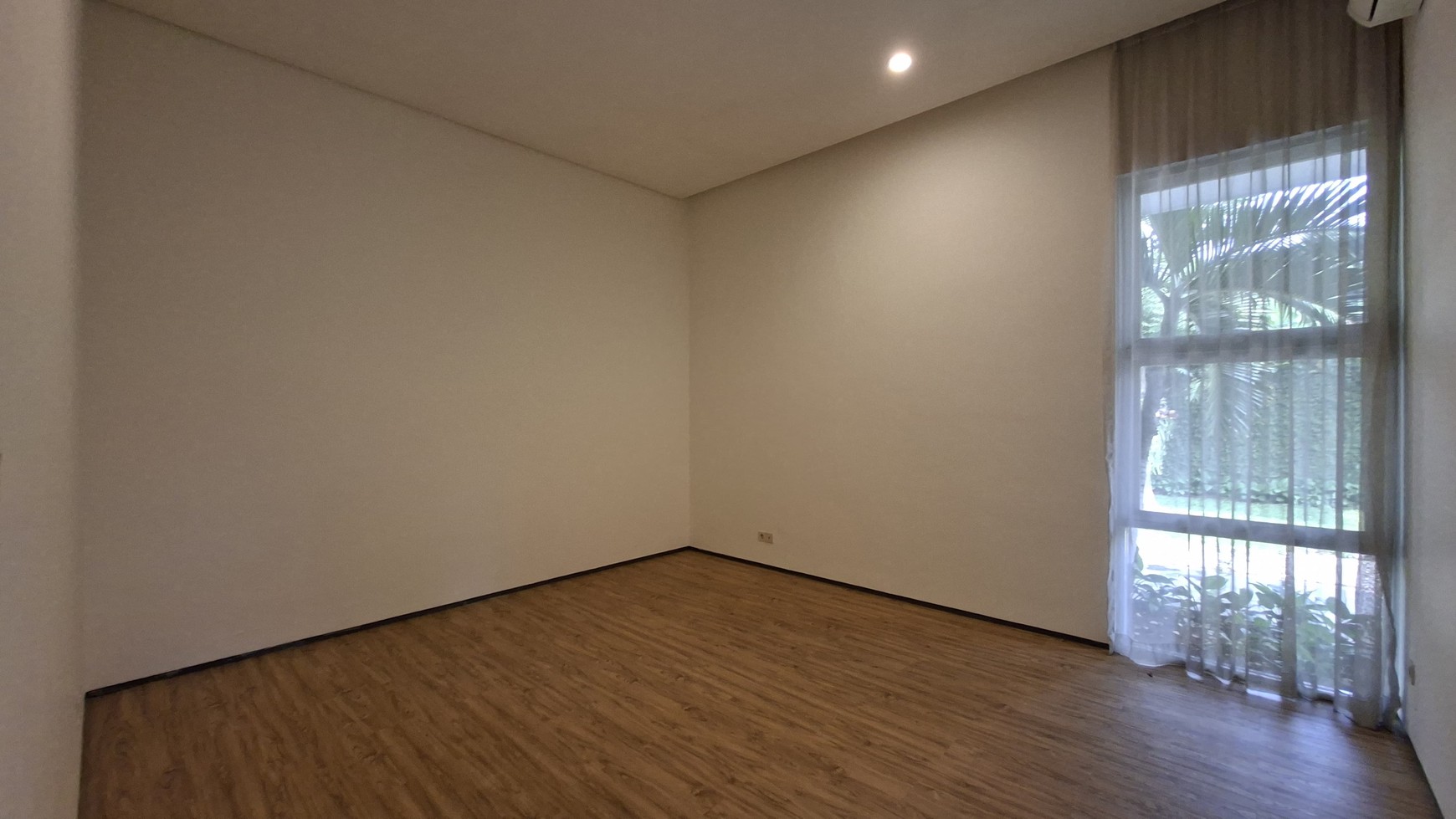 Large Piece Of Land with Modern Tropical House at Jl. Ampera Raya