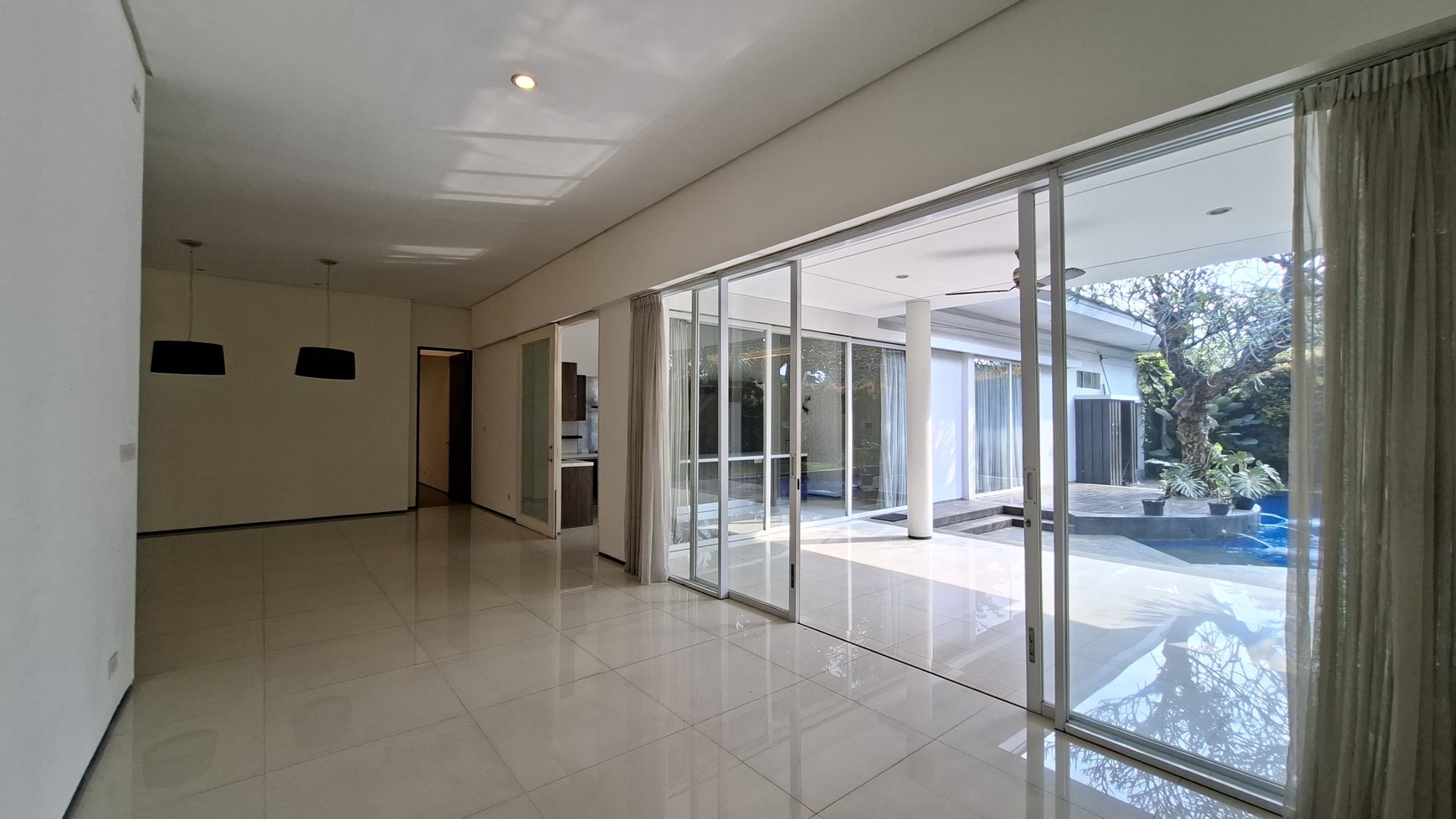 Large Piece Of Land with Modern Tropical House at Jl. Ampera Raya