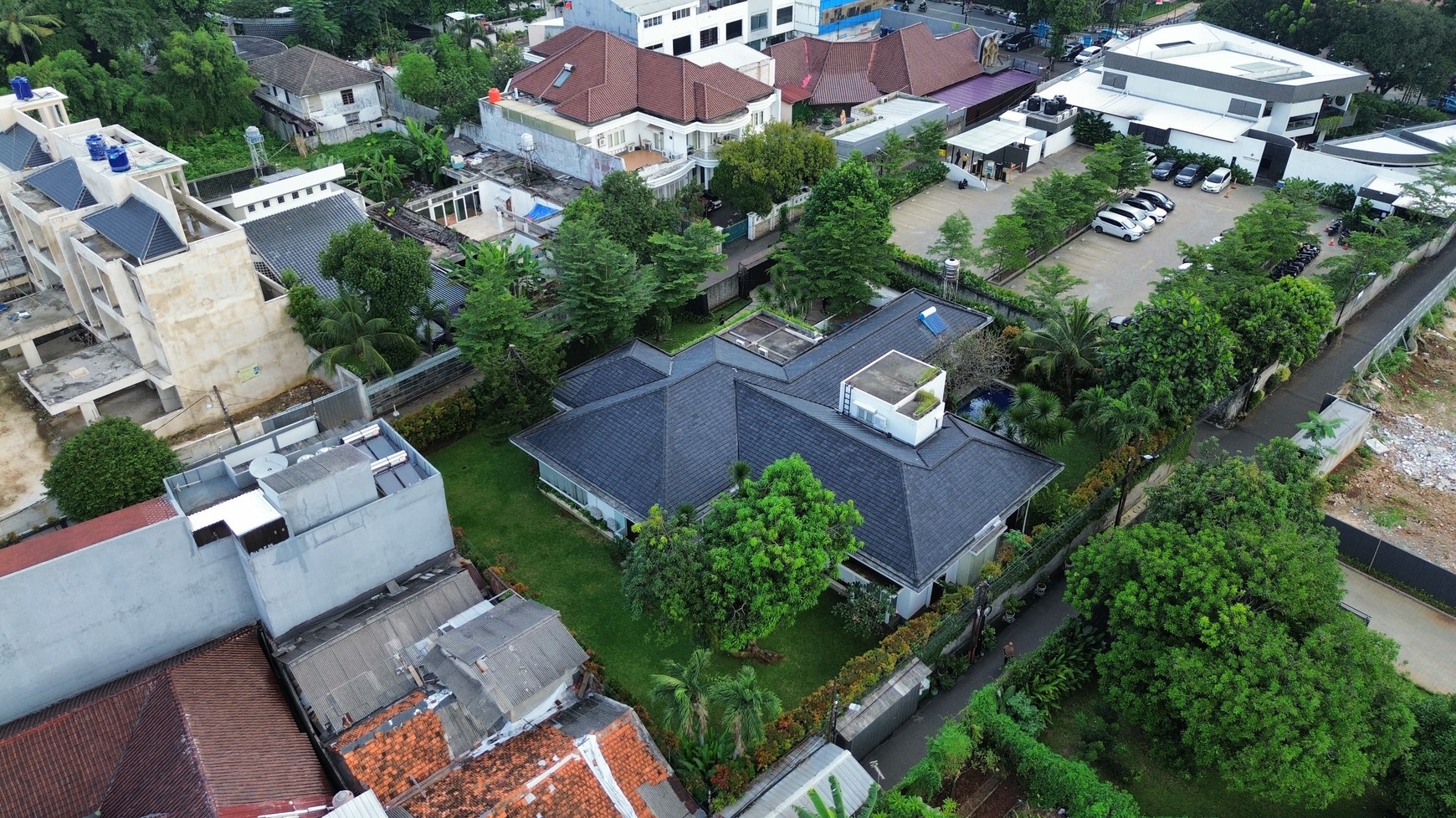 Large Piece Of Land with Modern Tropical House at Jl. Ampera Raya