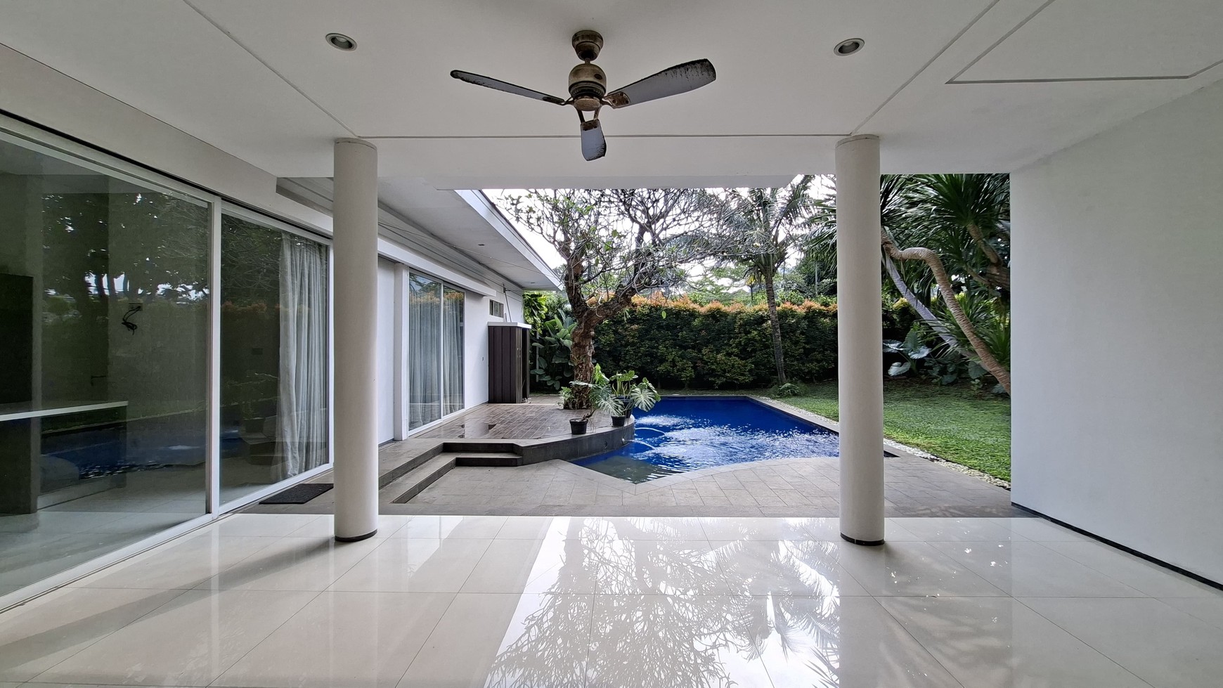 Large Piece Of Land with Modern Tropical House at Jl. Ampera Raya