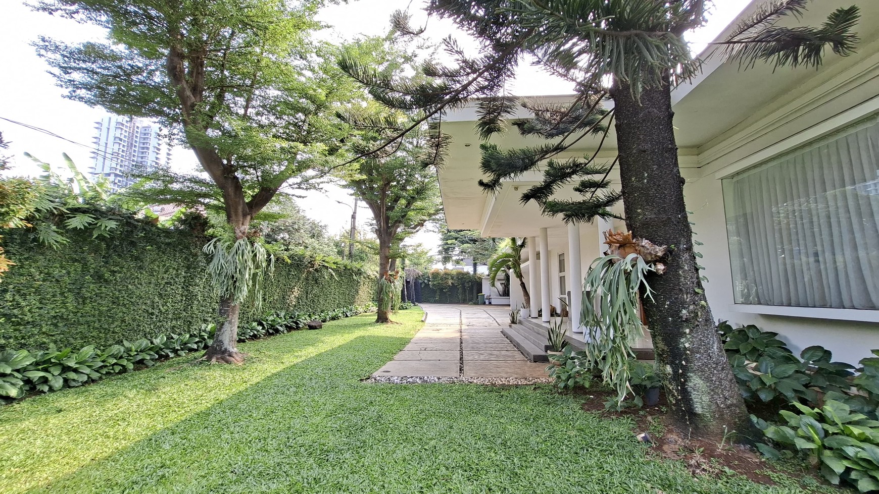 Large Piece Of Land with Modern Tropical House at Jl. Ampera Raya