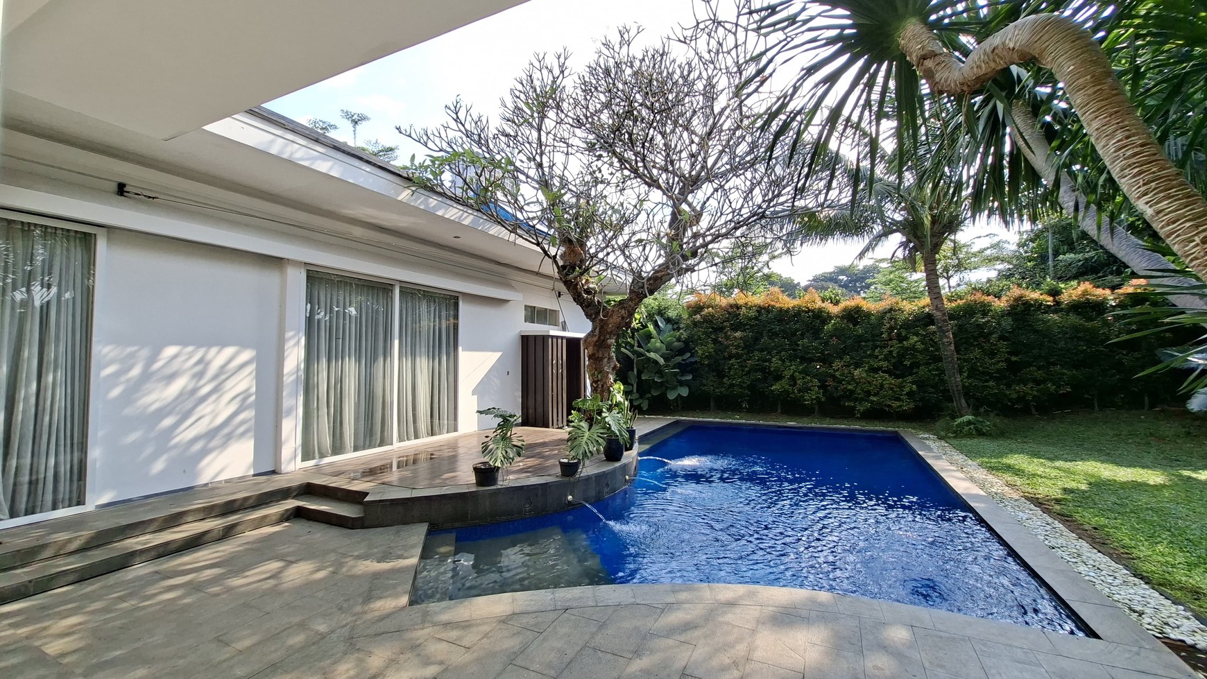 Large Piece Of Land with Modern Tropical House at Jl. Ampera Raya