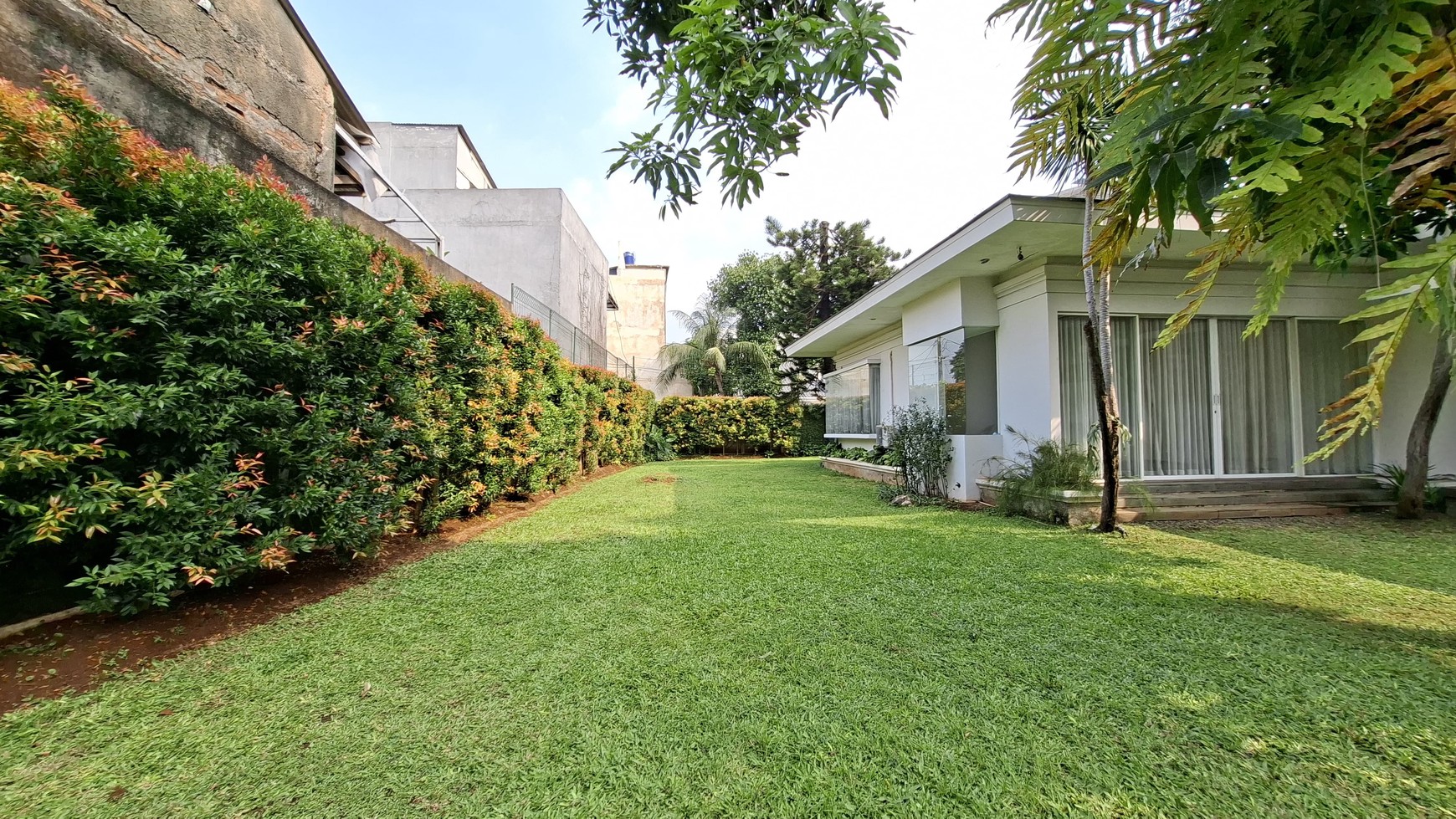 Large Piece Of Land with Modern Tropical House at Jl. Ampera Raya