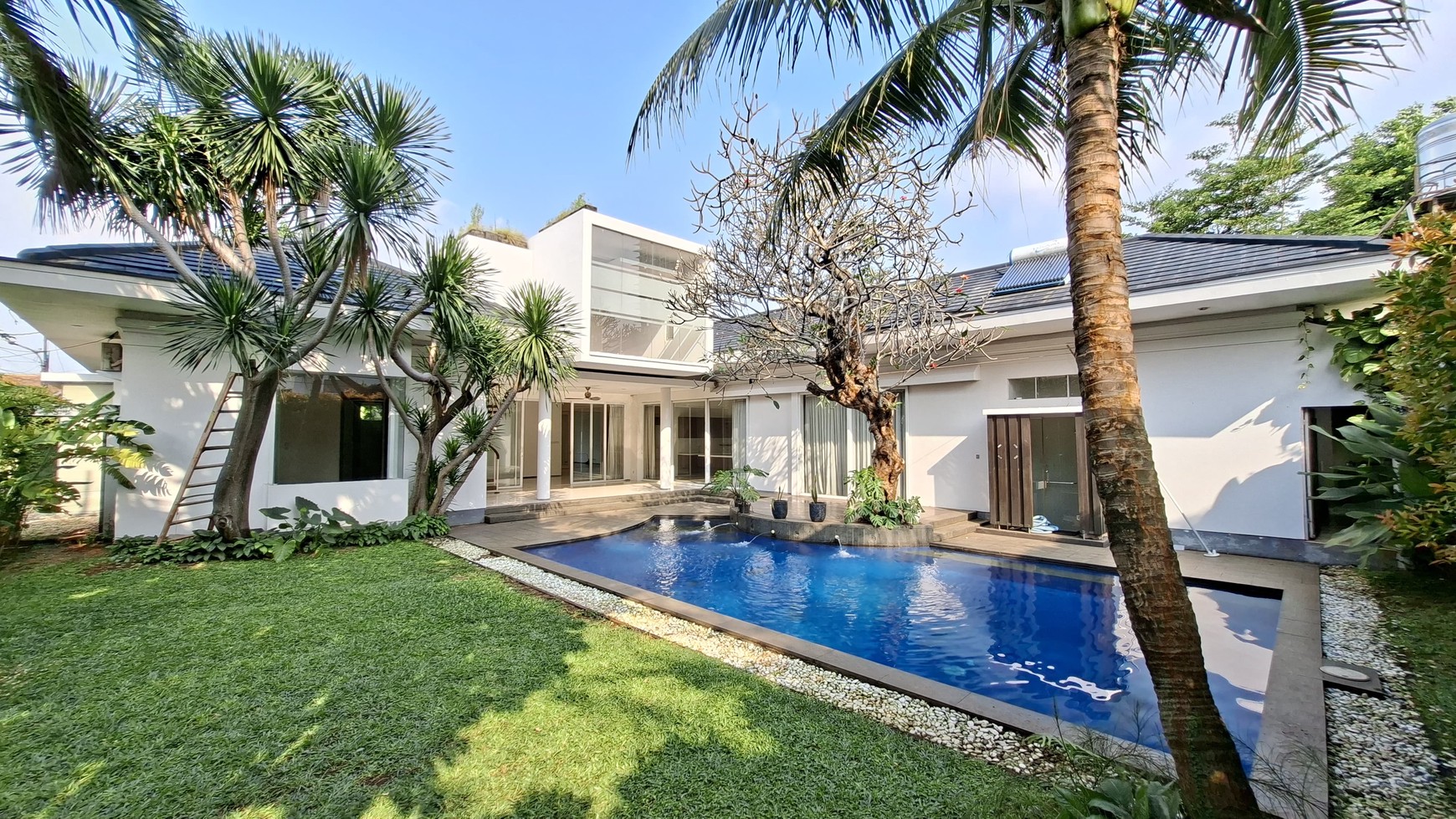 Large Piece Of Land with Modern Tropical House at Jl. Ampera Raya