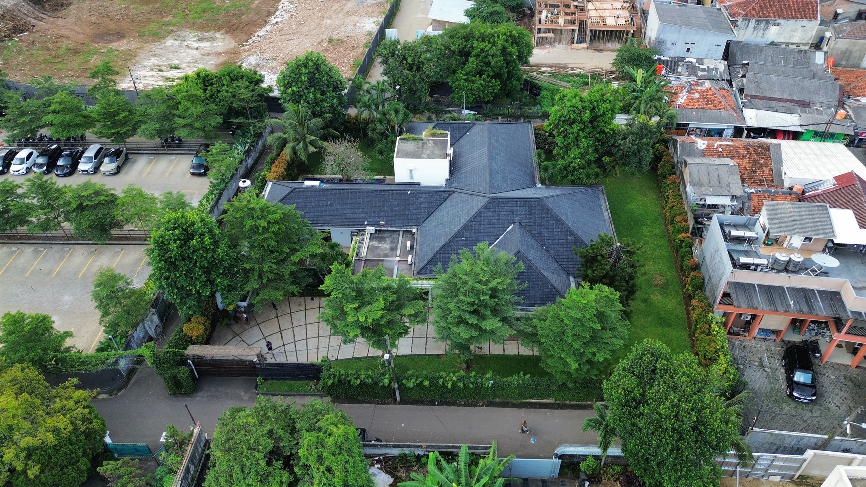 Large Piece Of Land with Modern Tropical House at Jl. Ampera Raya