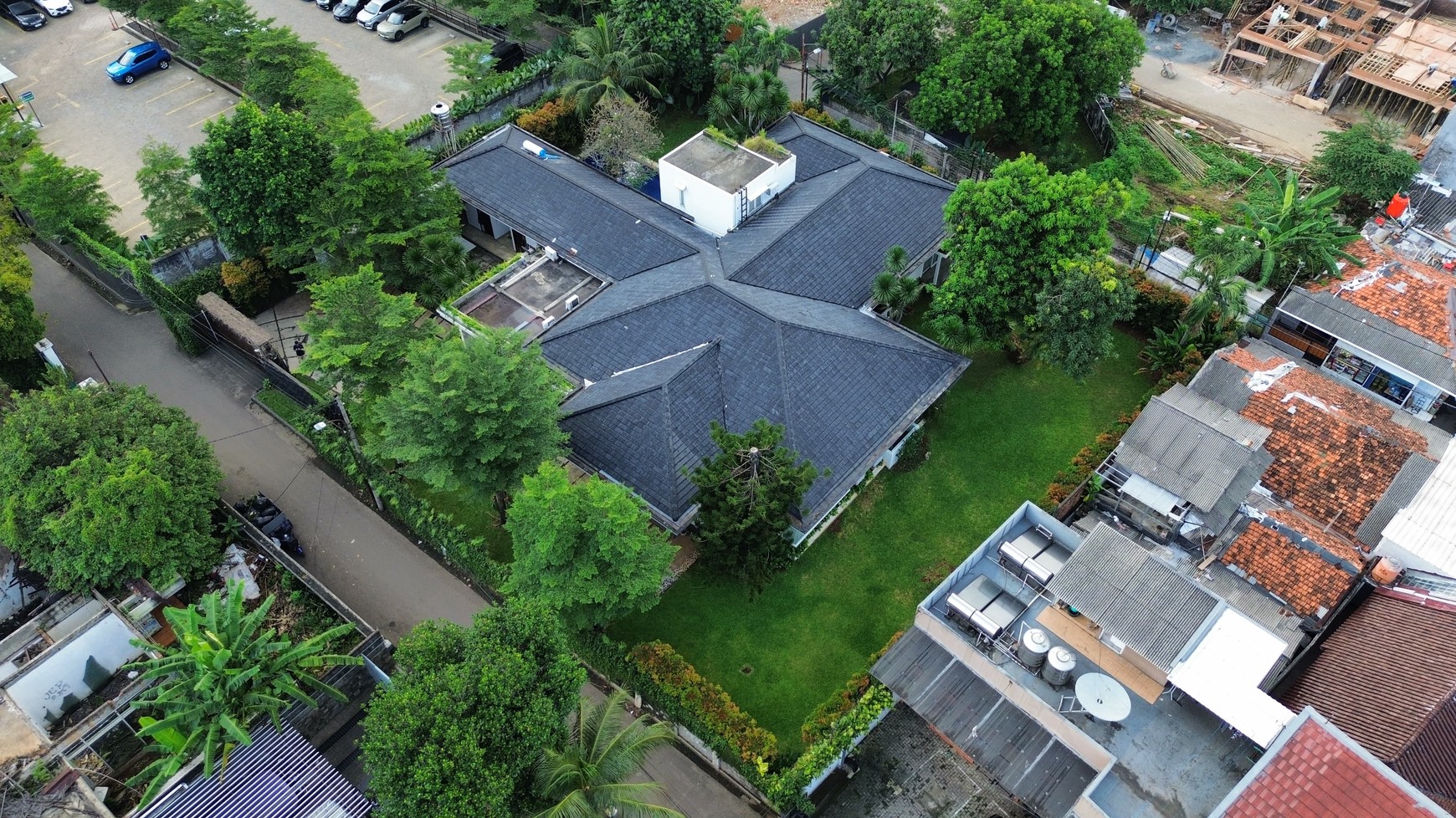 Large Piece Of Land with Modern Tropical House at Jl. Ampera Raya