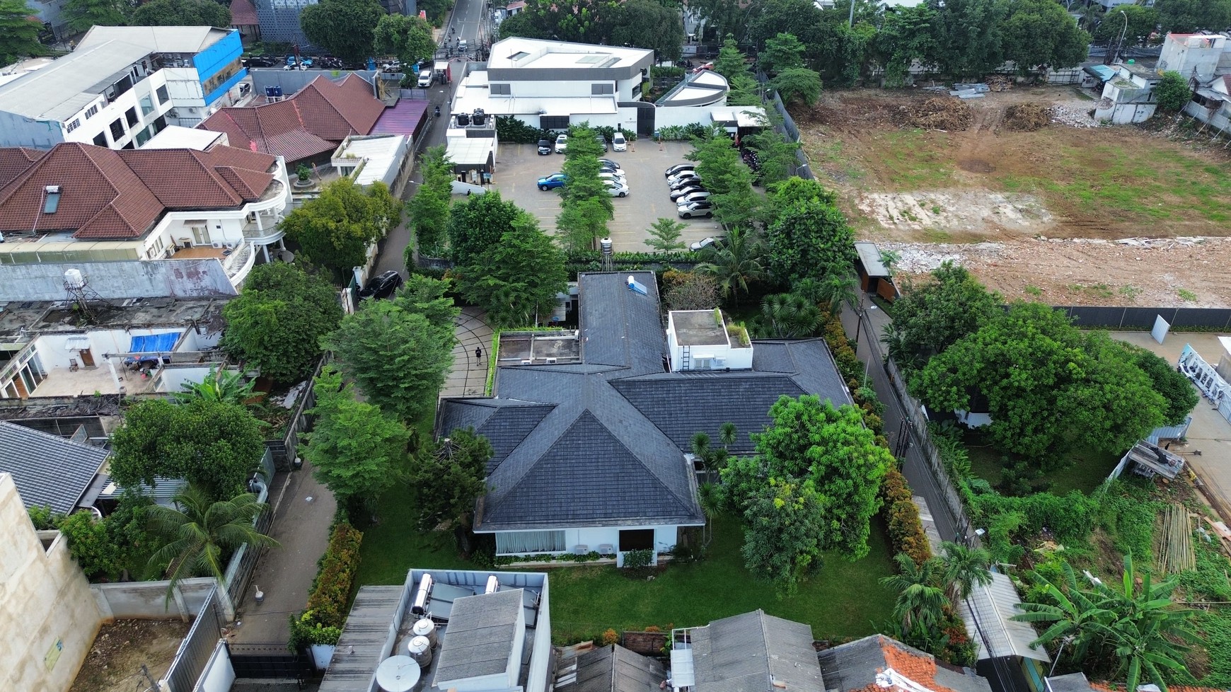 Large Piece Of Land with Modern Tropical House at Jl. Ampera Raya
