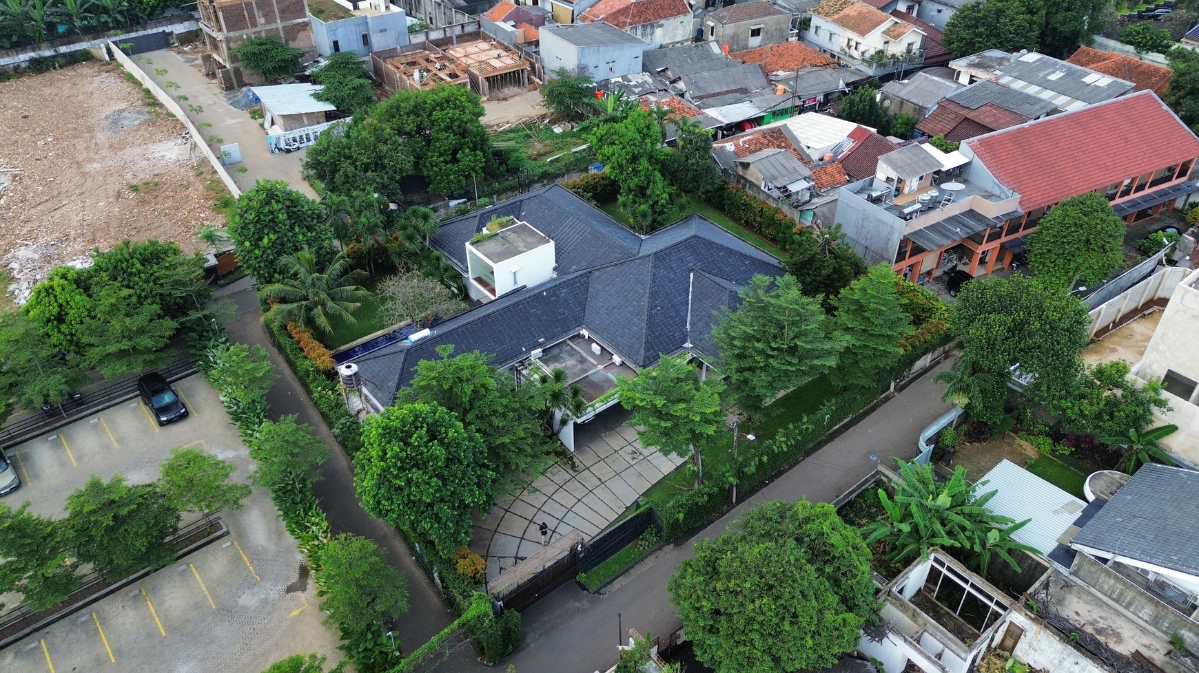 Large Piece Of Land with Modern Tropical House at Jl. Ampera Raya