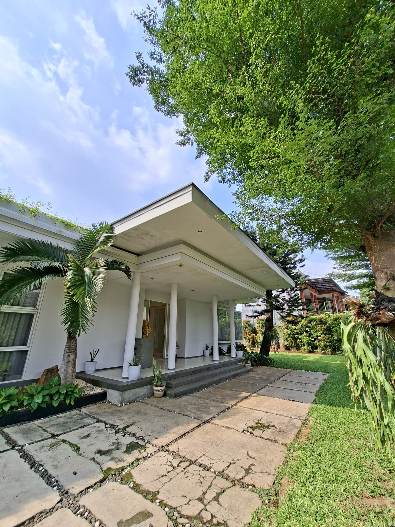Large Piece Of Land with Modern Tropical House at Jl. Ampera Raya