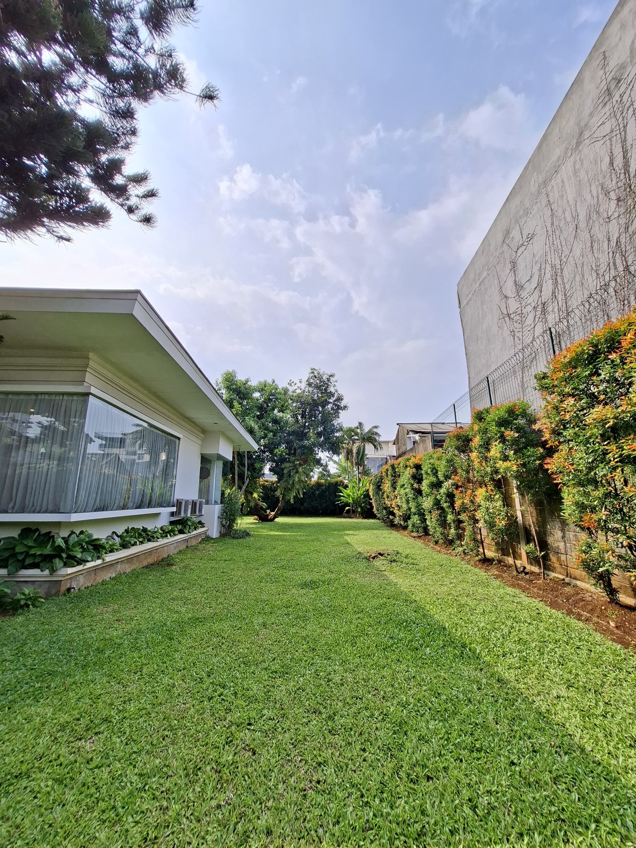 Large Piece Of Land with Modern Tropical House at Jl. Ampera Raya