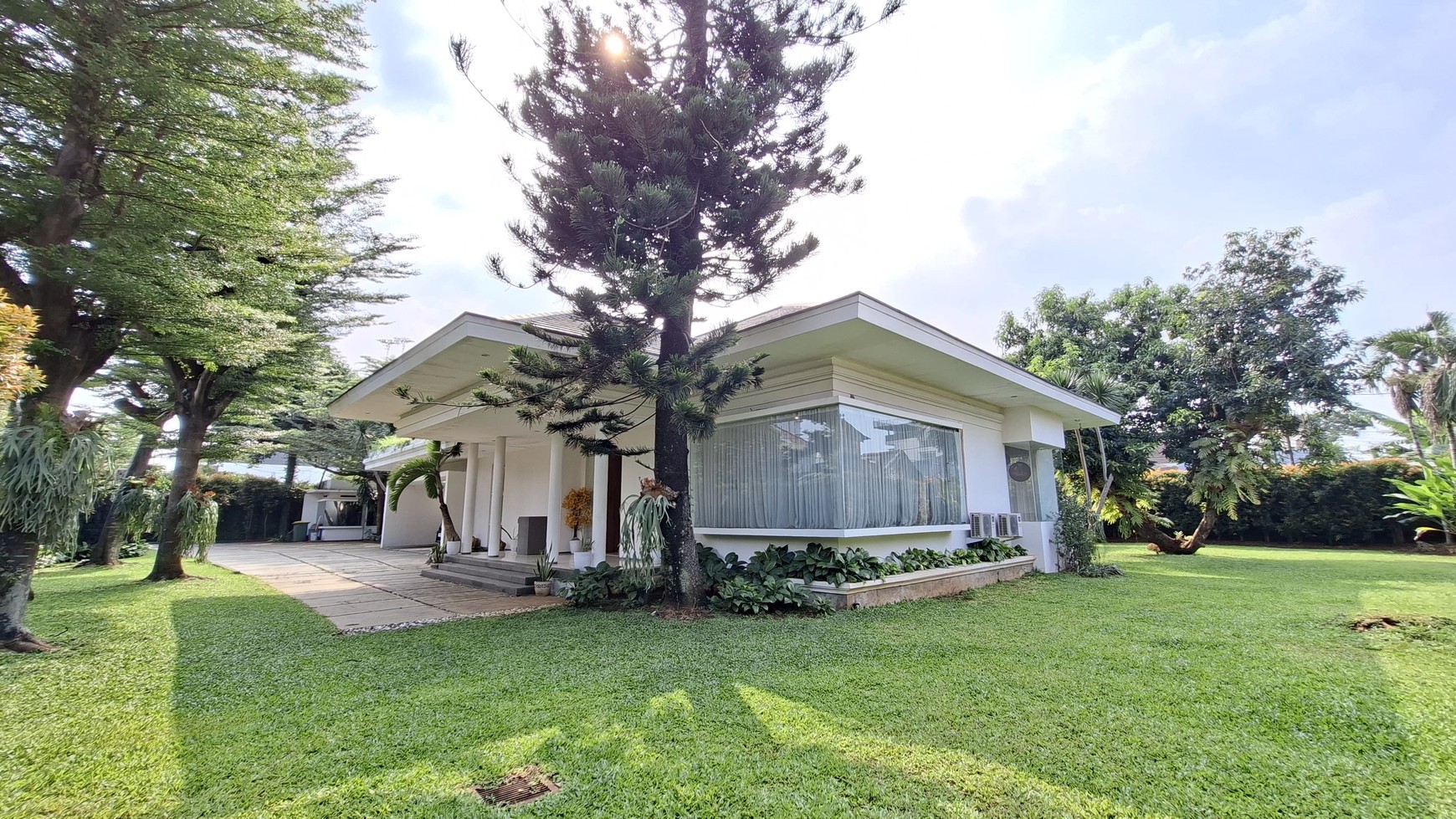 Large Piece Of Land with Modern Tropical House at Jl. Ampera Raya