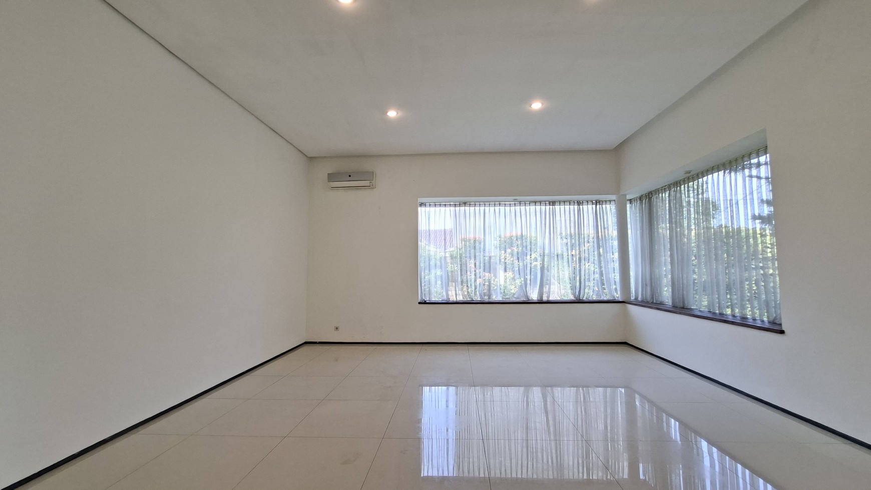 Large Piece Of Land with Modern Tropical House at Jl. Ampera Raya