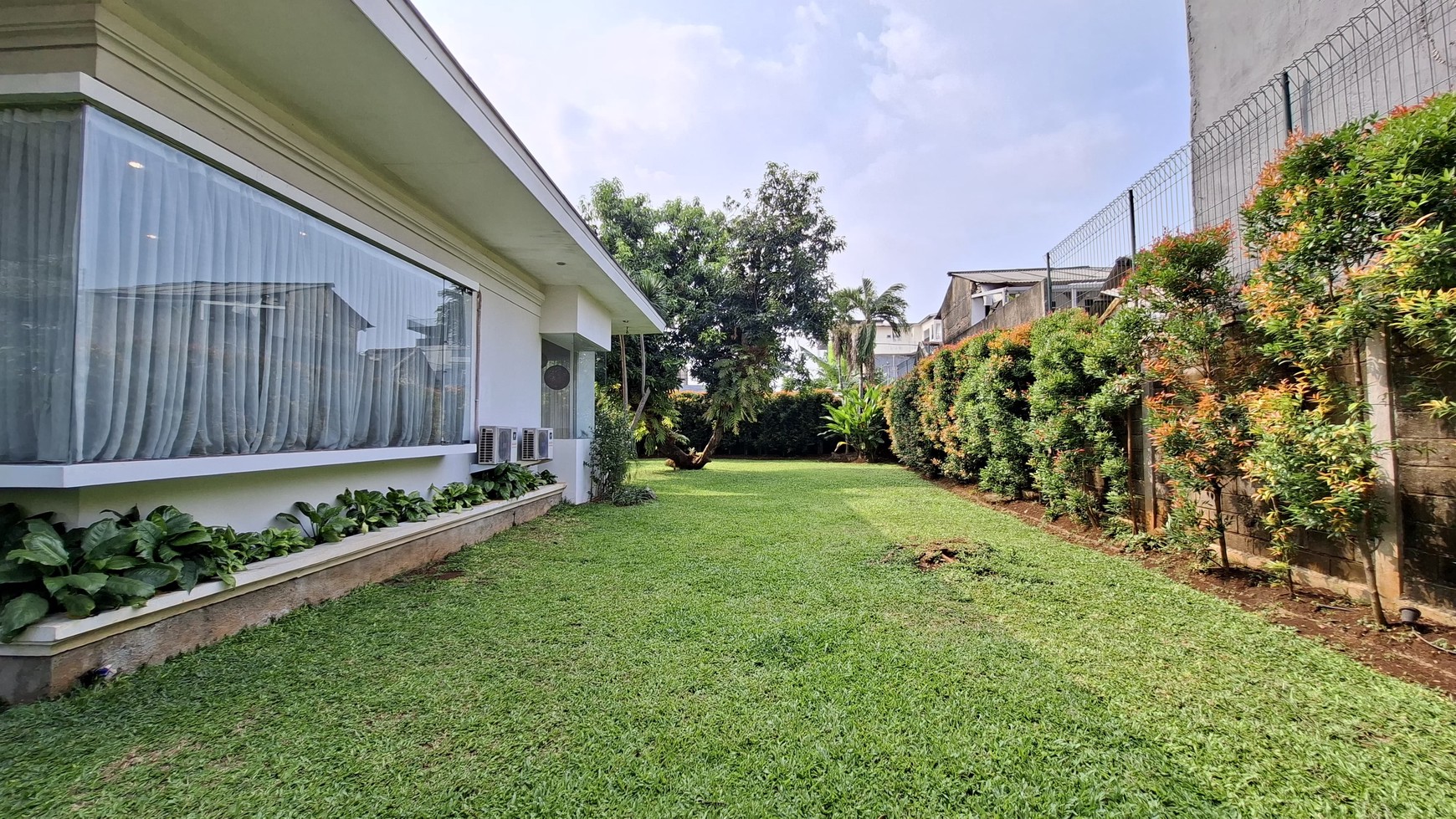 Large Piece Of Land with Modern Tropical House at Jl. Ampera Raya