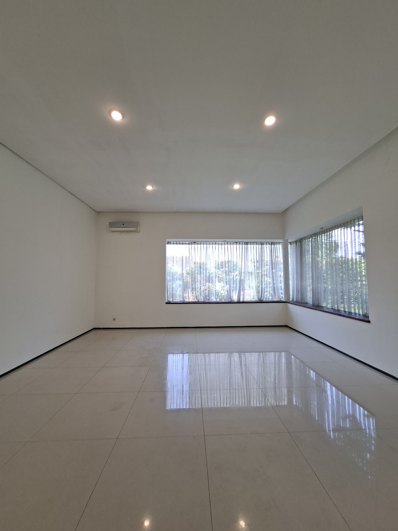 Large Piece Of Land with Modern Tropical House at Jl. Ampera Raya