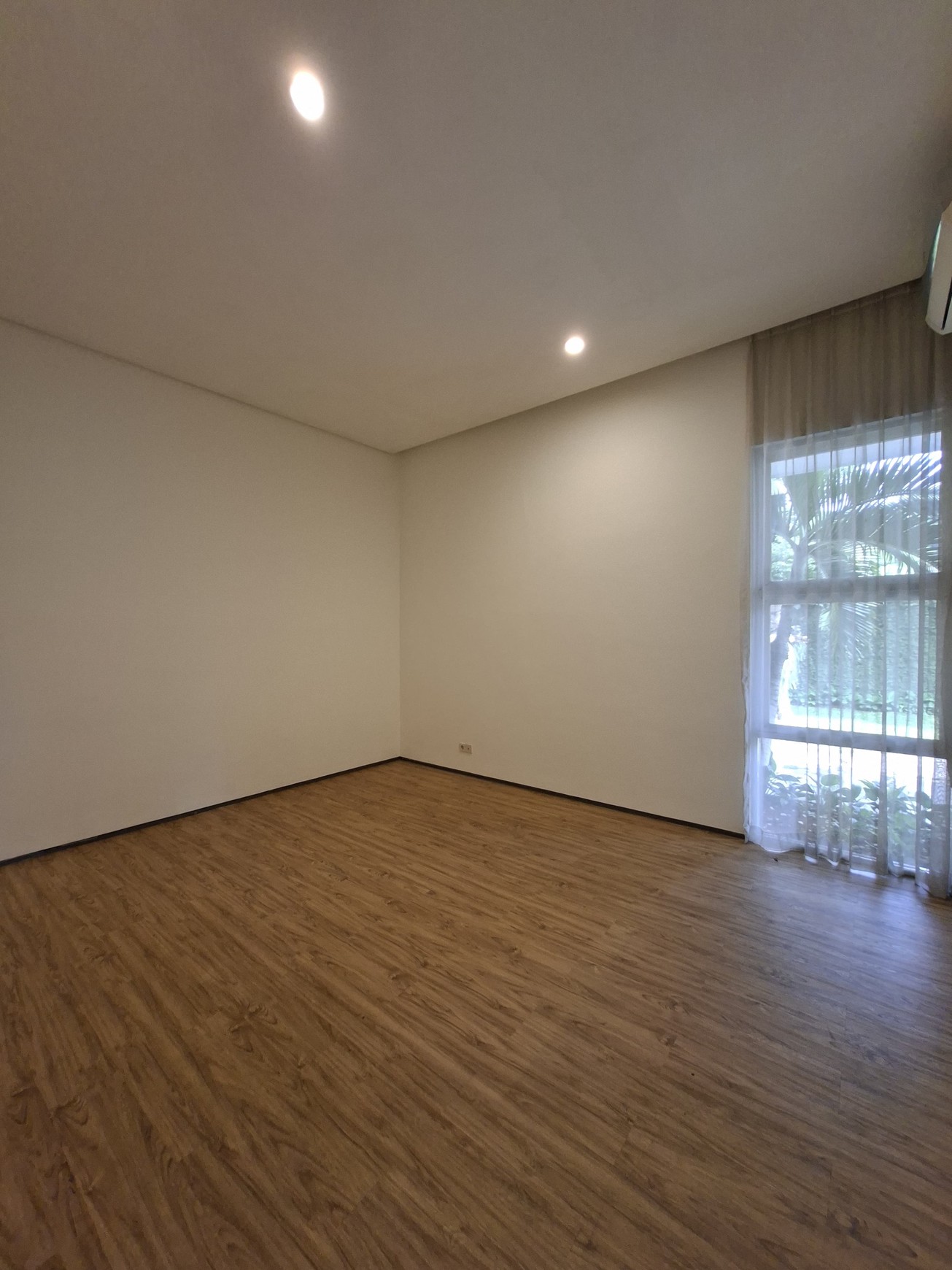 Large Piece Of Land with Modern Tropical House at Jl. Ampera Raya