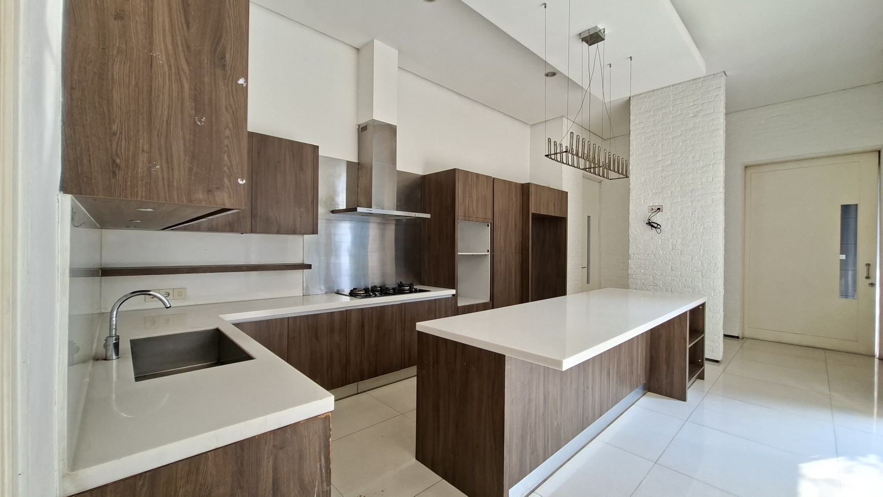 Large Piece Of Land with Modern Tropical House at Jl. Ampera Raya