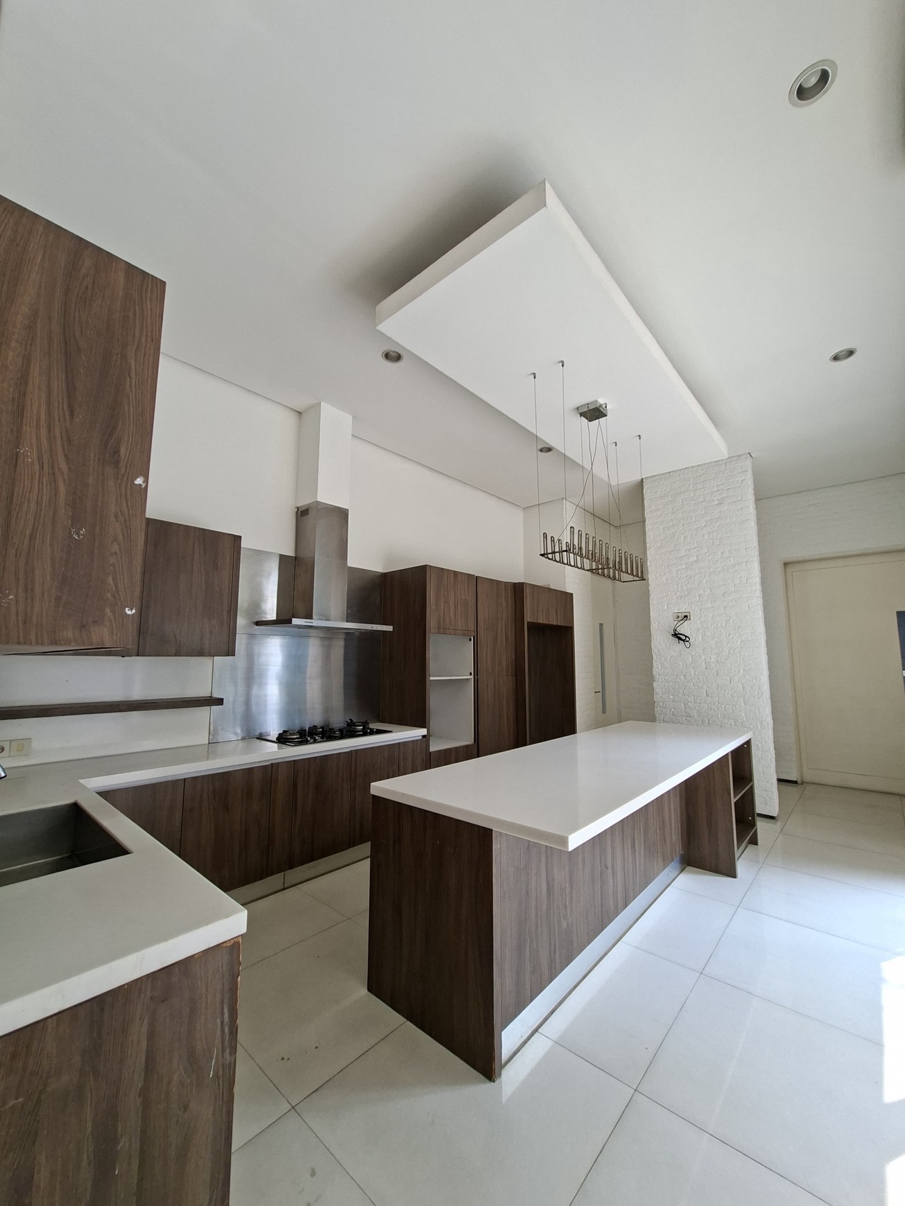 Large Piece Of Land with Modern Tropical House at Jl. Ampera Raya