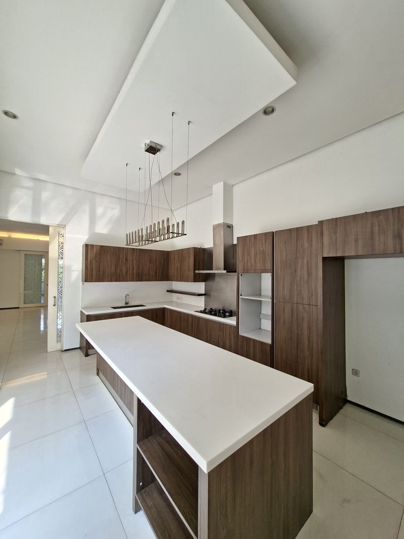 Large Piece Of Land with Modern Tropical House at Jl. Ampera Raya