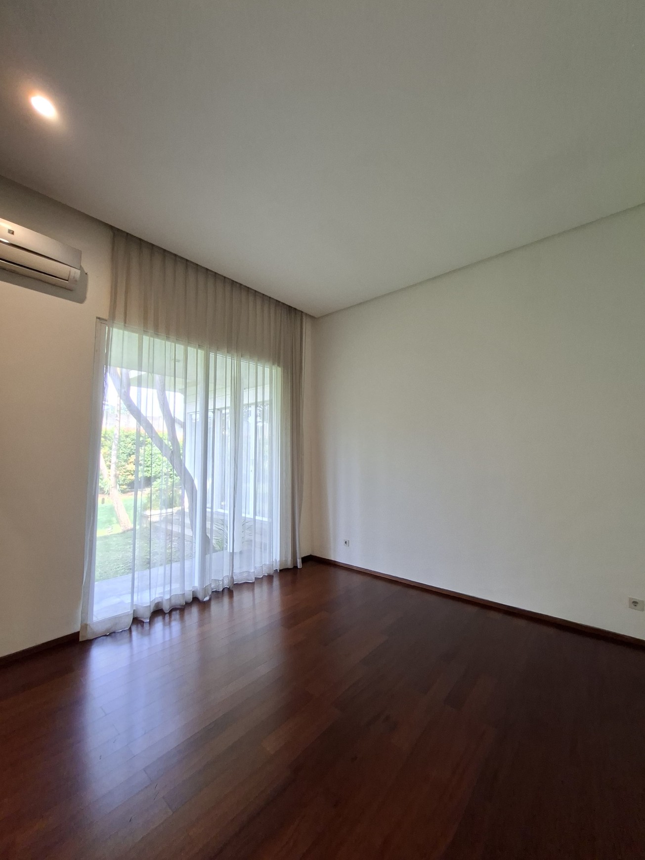 Large Piece Of Land with Modern Tropical House at Jl. Ampera Raya