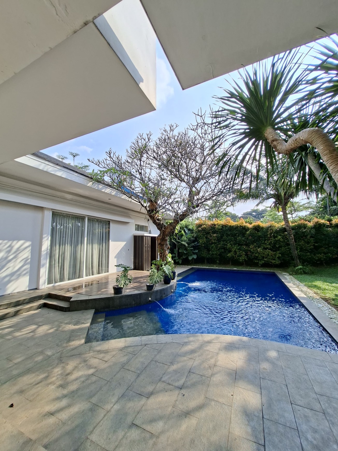 Large Piece Of Land with Modern Tropical House at Jl. Ampera Raya