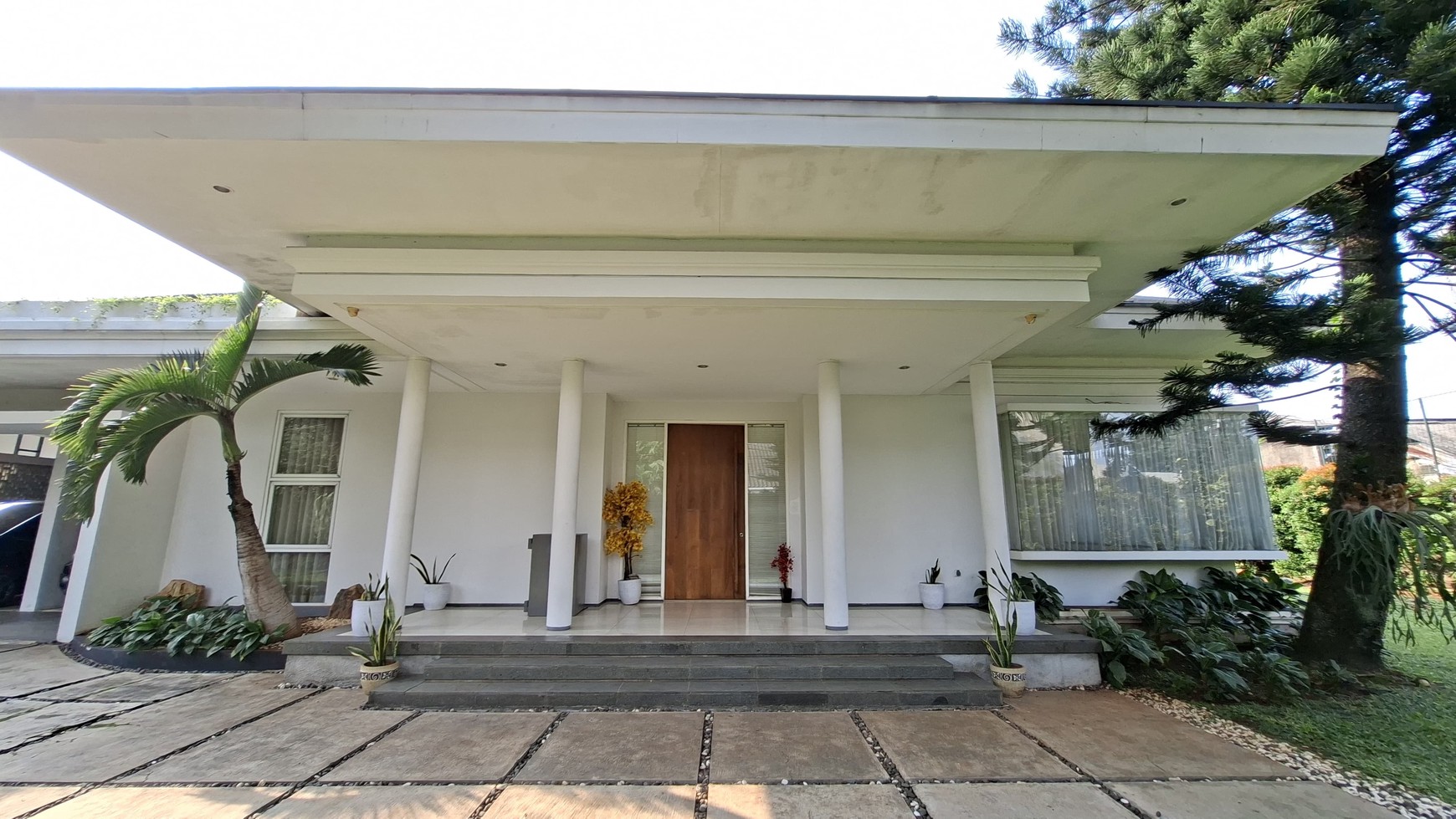 Large Piece Of Land with Modern Tropical House at Jl. Ampera Raya