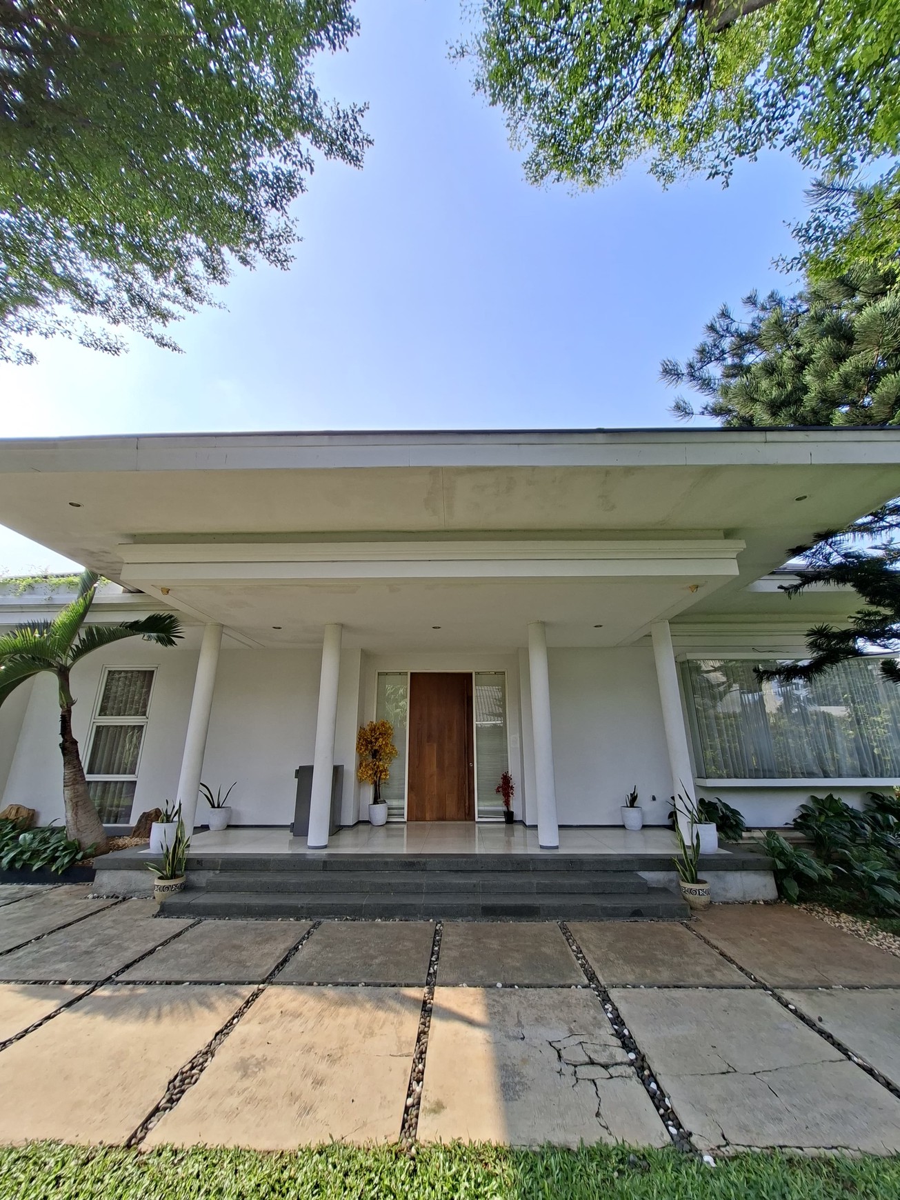 Large Piece Of Land with Modern Tropical House at Jl. Ampera Raya