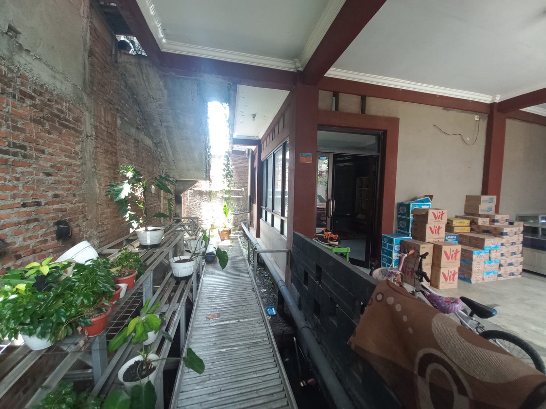 Rumah Strategis + Klinik di Jl. KH Fudholi, Karang Asih - Lokasi Ramai & Potensial Bisnis