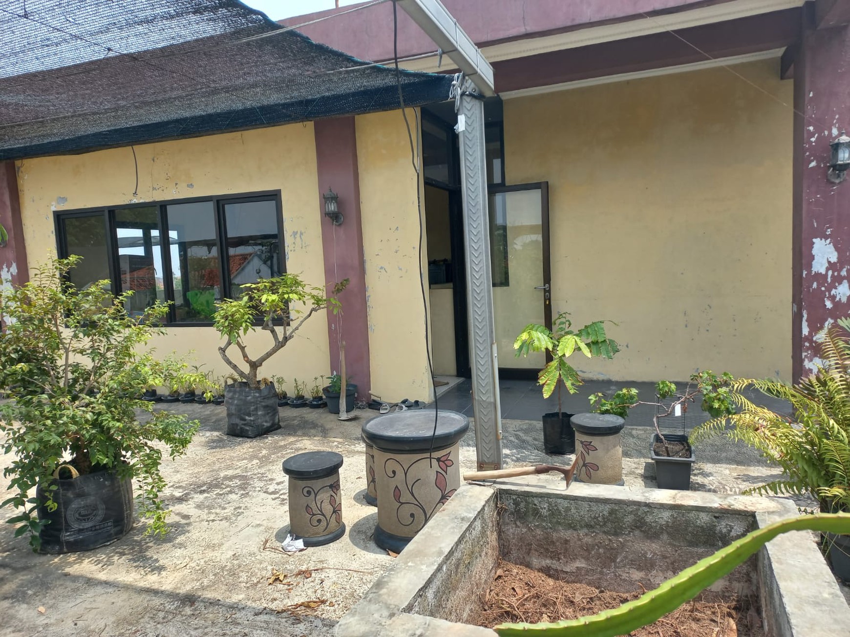 Rumah Strategis + Klinik di Jl. KH Fudholi, Karang Asih - Lokasi Ramai & Potensial Bisnis