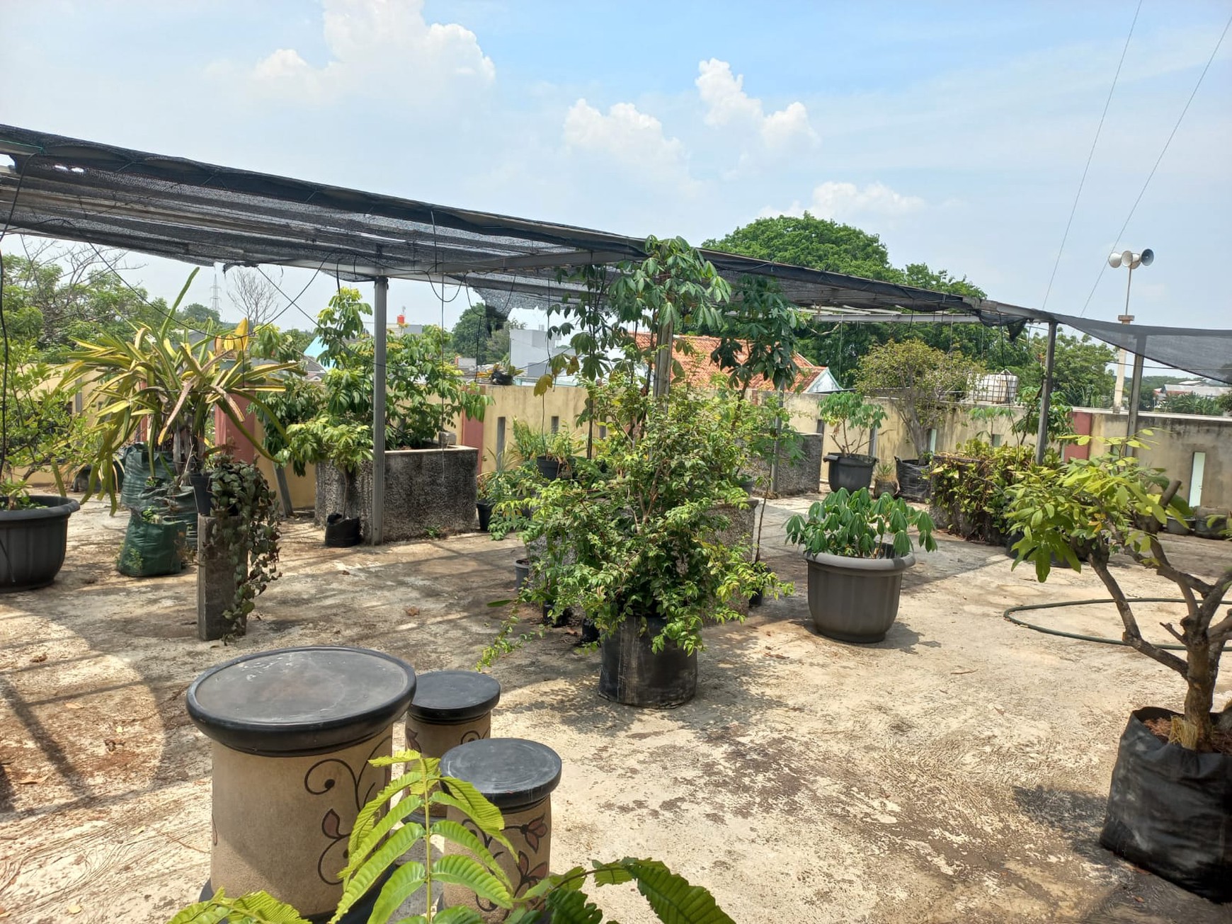 Rumah Strategis + Klinik di Jl. KH Fudholi, Karang Asih - Lokasi Ramai & Potensial Bisnis