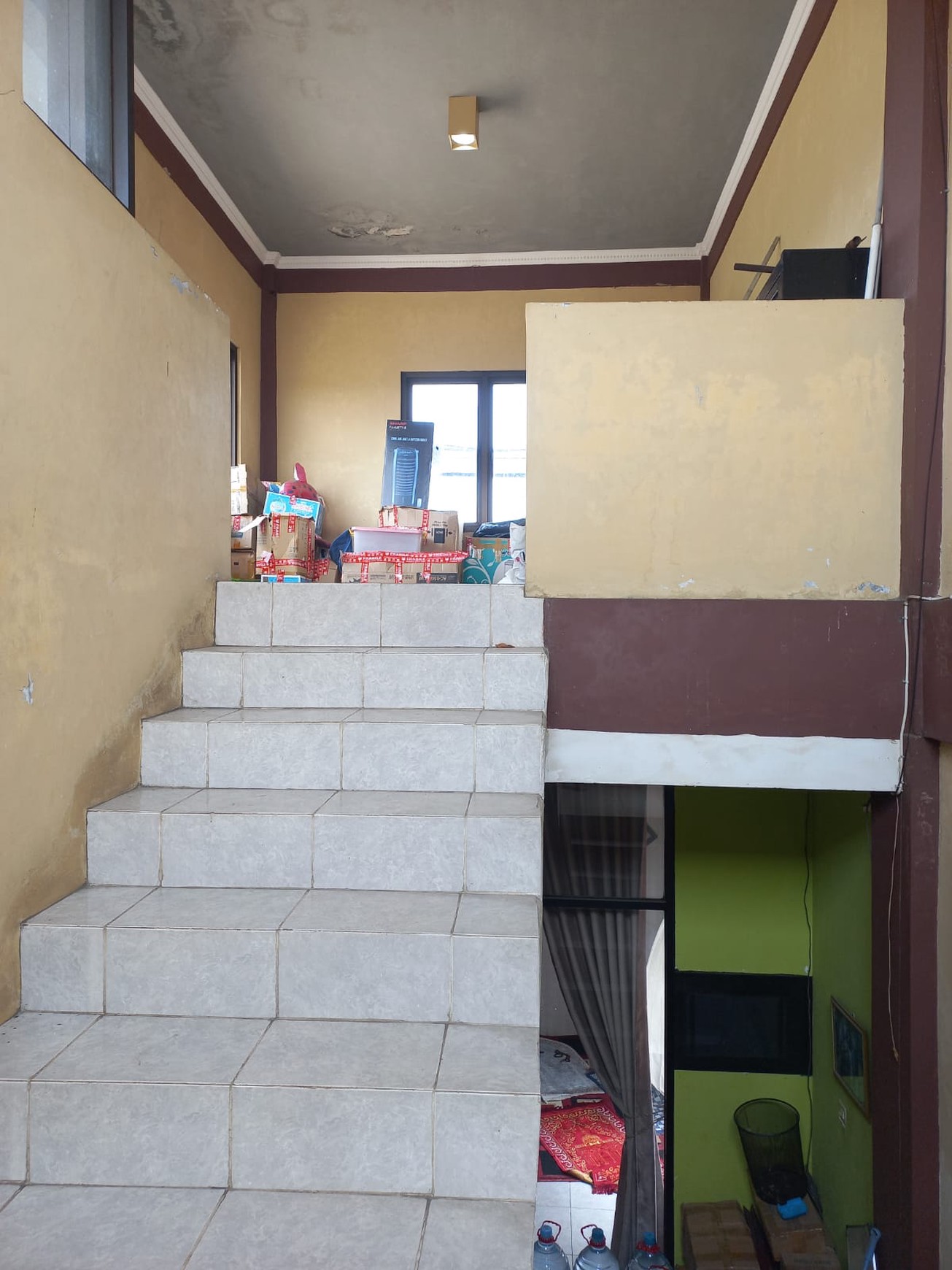 Rumah Strategis + Klinik di Jl. KH Fudholi, Karang Asih - Lokasi Ramai & Potensial Bisnis