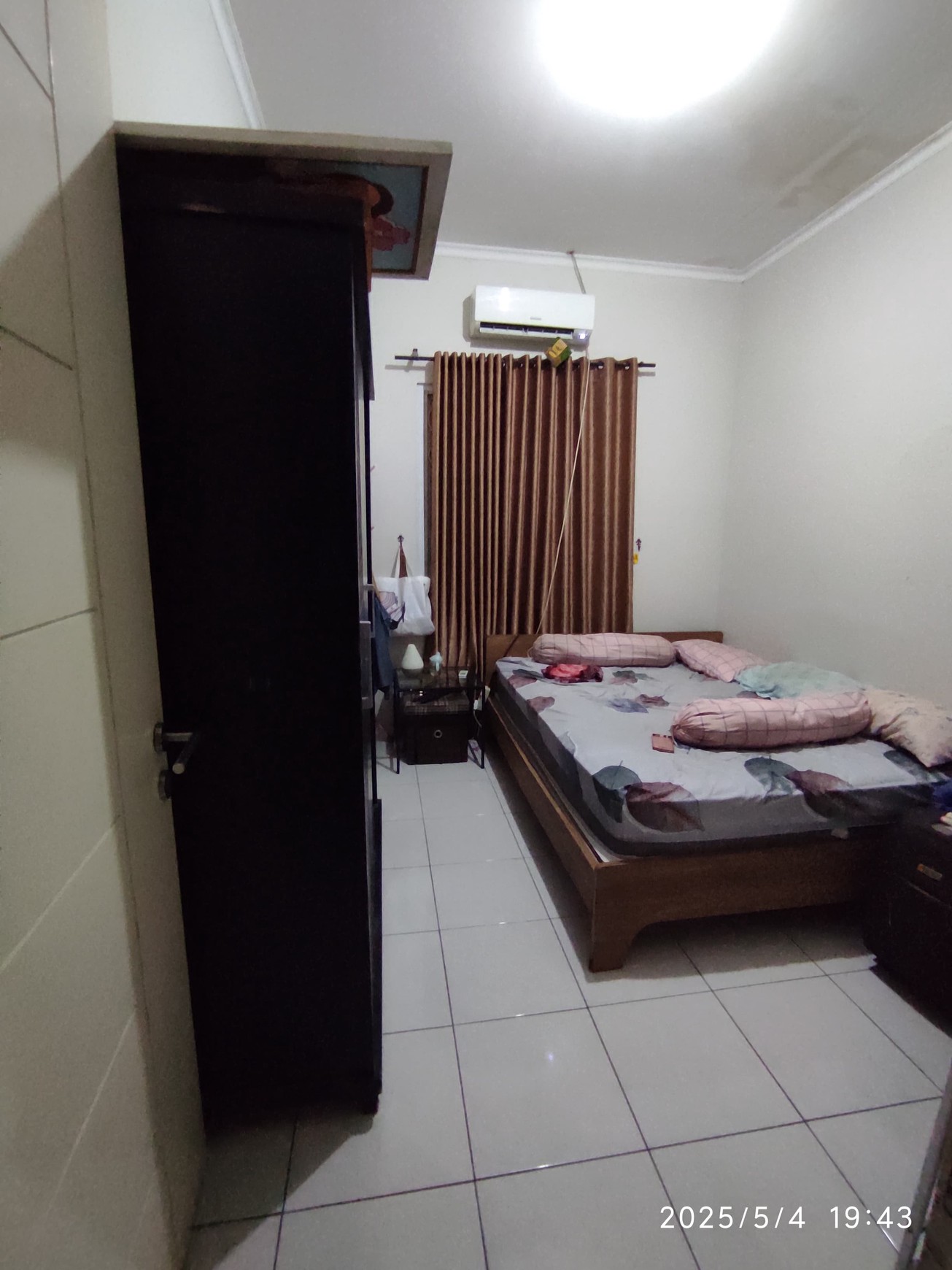 Rumah di Kota Wisata