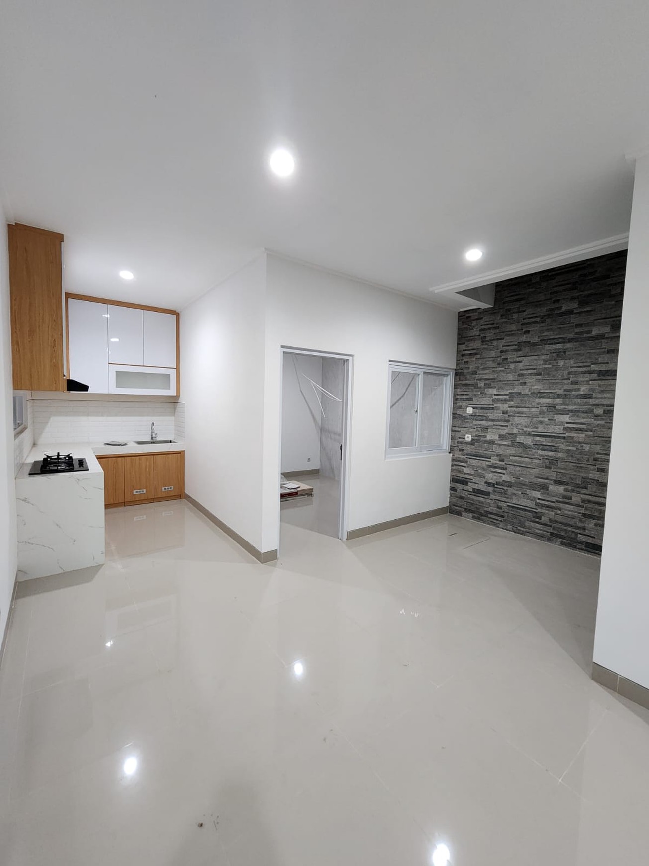 Rumah Dalam Perum Griya Kuantan Banyuraden, Gamping, Sleman.