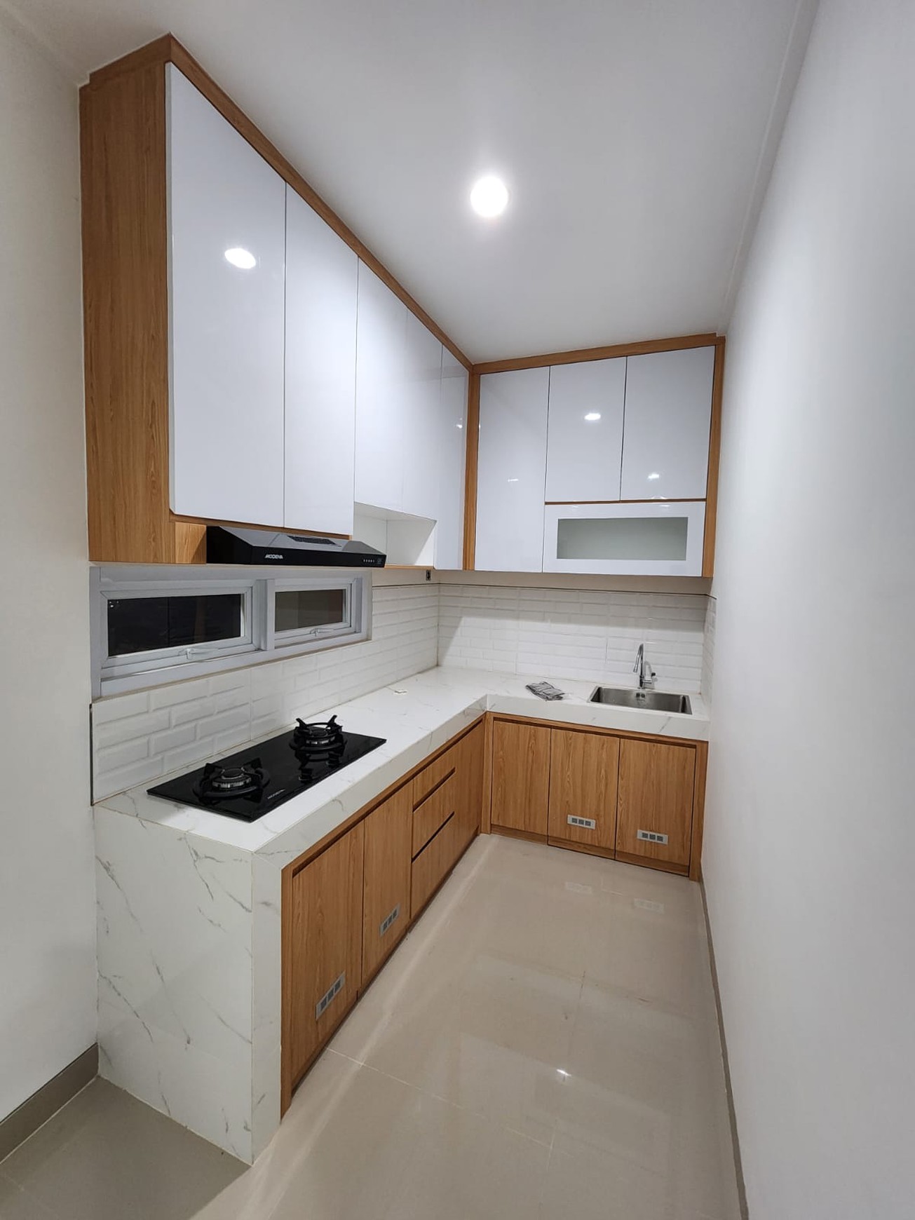 Rumah Dalam Perum Griya Kuantan Banyuraden, Gamping, Sleman.