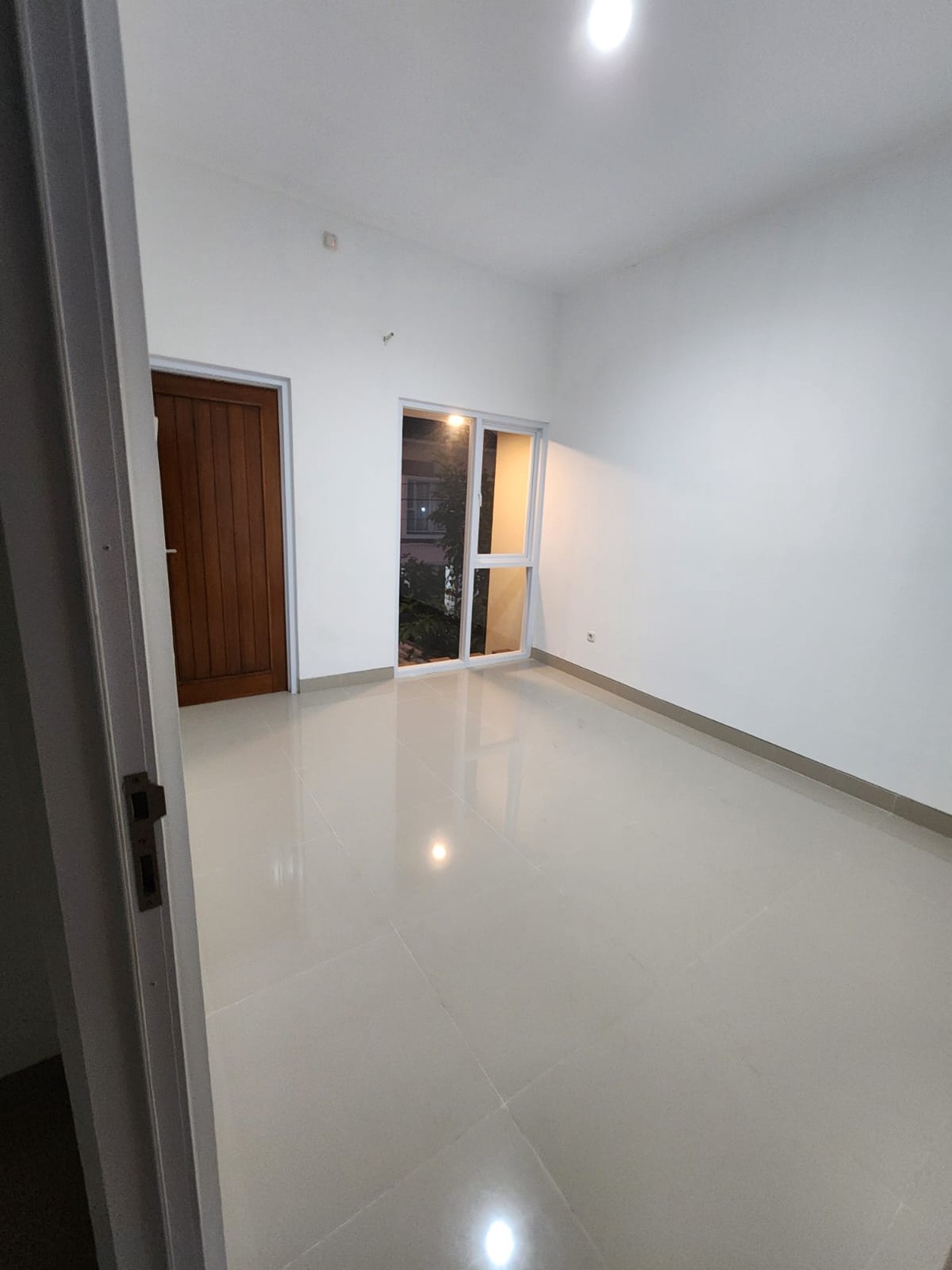 Rumah Dalam Perum Griya Kuantan Banyuraden, Gamping, Sleman.