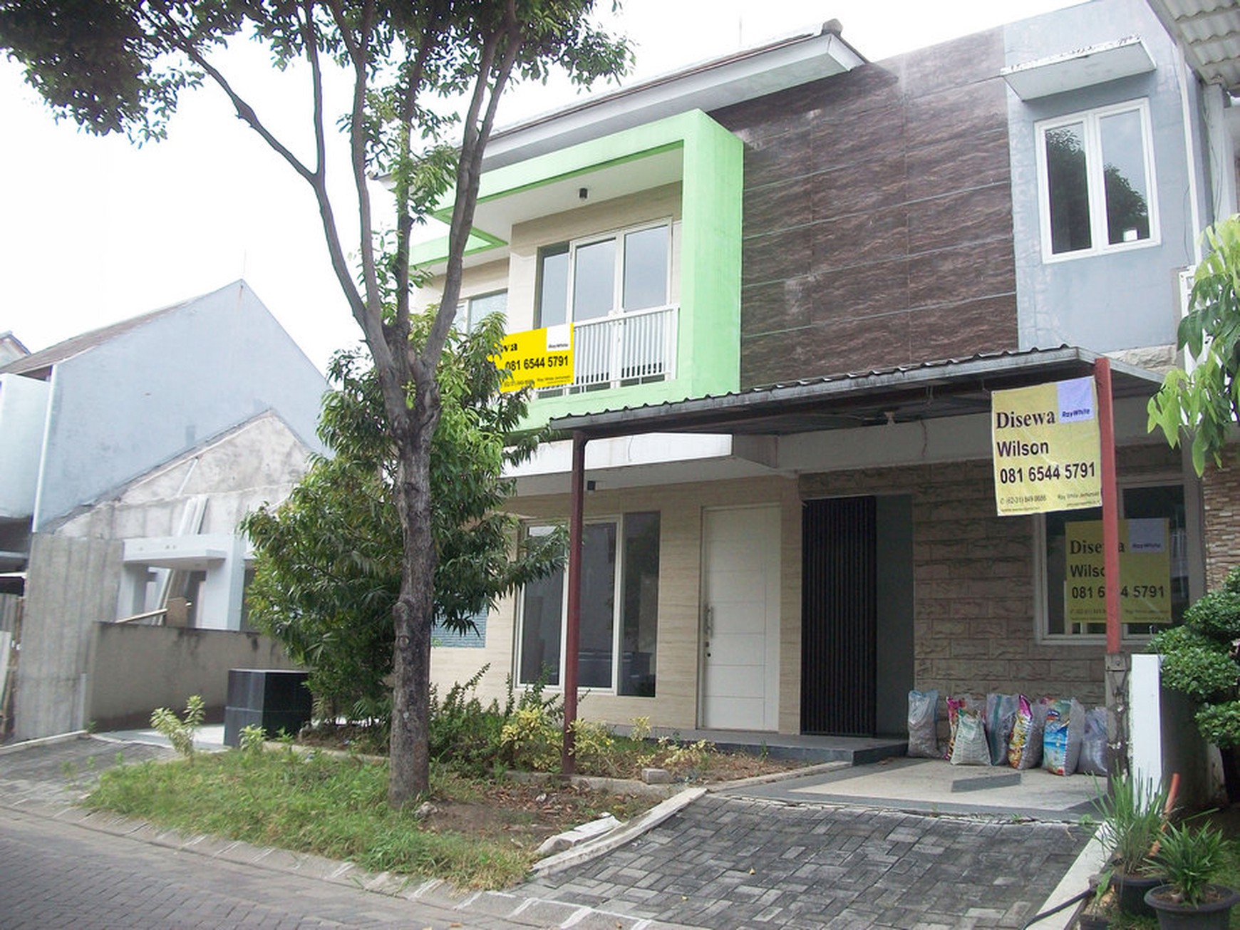 Rumah di Citraland Woodland Surabaya Barat, 2 Lantai, Minimalis, SIAP HUNI, Sewa min 2 tahun - WS -