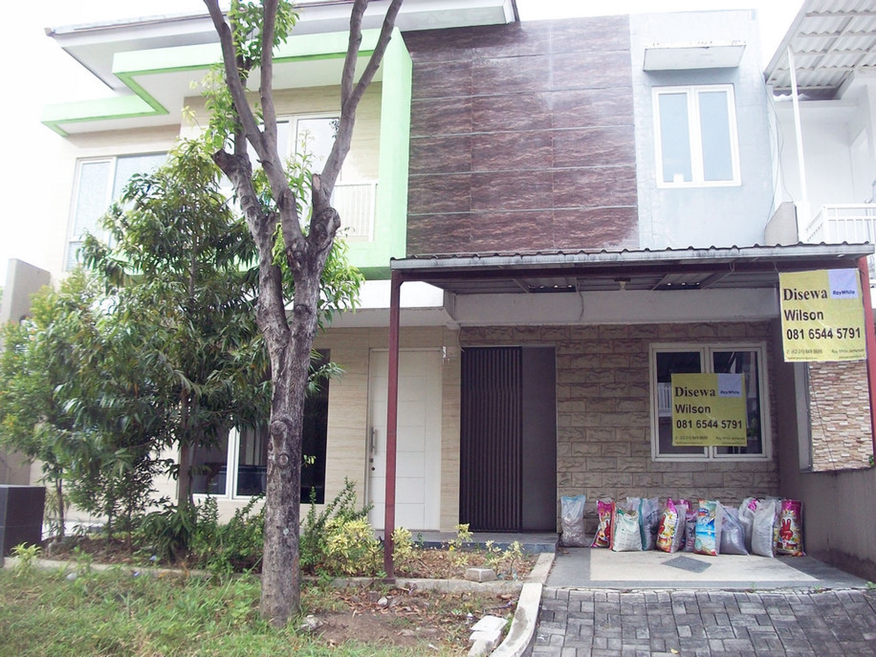 Rumah di Citraland Woodland Surabaya Barat, 2 Lantai, Minimalis, SIAP HUNI, Sewa min 2 tahun - WS -