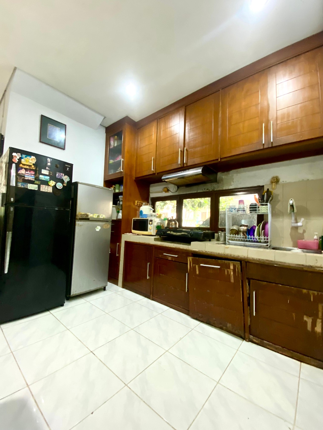 Rumah siap huni dengan harga terjangkau  memiliki Taman luas di Bintaro