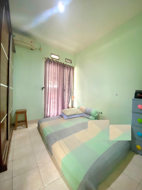 Rumah siap huni Lokasi strategis di Graha Raya 