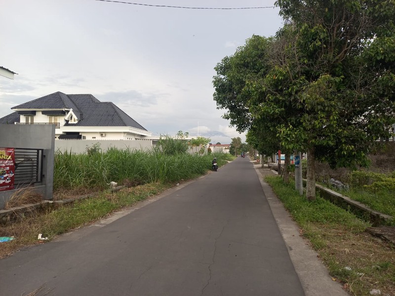 Tanah Sawah Akses 2 Muka Jalan 2.447 Meter Persegi Hook Di Maguwoharjo, Sleman