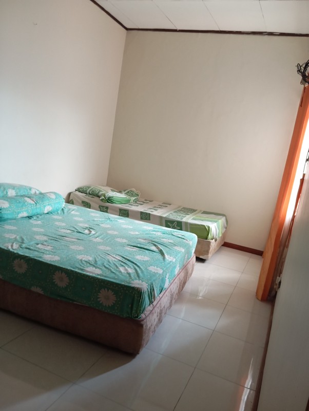 Rumah 2 Lt Strategis Bebas Banjir Pinggir Jalan Dekat Fasilitas Premium Grand Wisata