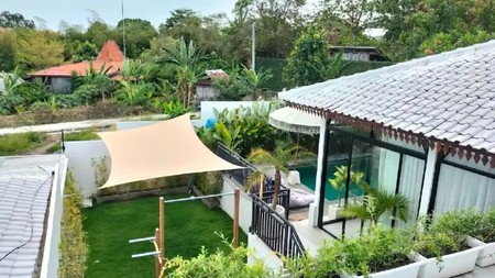 For Sale Leasehold - White villa joglo style with rice field views  in  Canggu - Bali