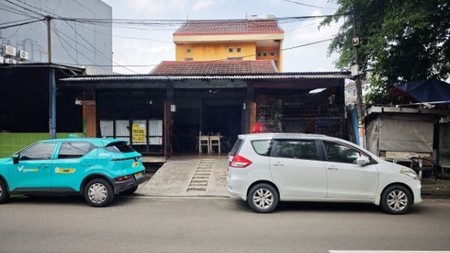 Rumah Usaha, jalan ramai hanya 100m dari Makaliwe Raya, sudah tinggi dari jalan lebar muka 10m, panjang 20m