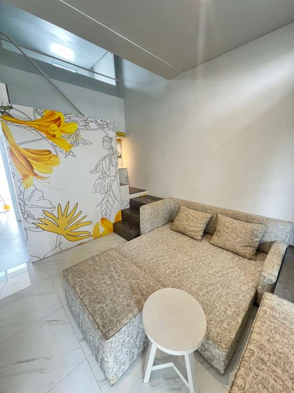 Langka Rumah di Tabebuya Furhished  dengan Halaman Belakang 