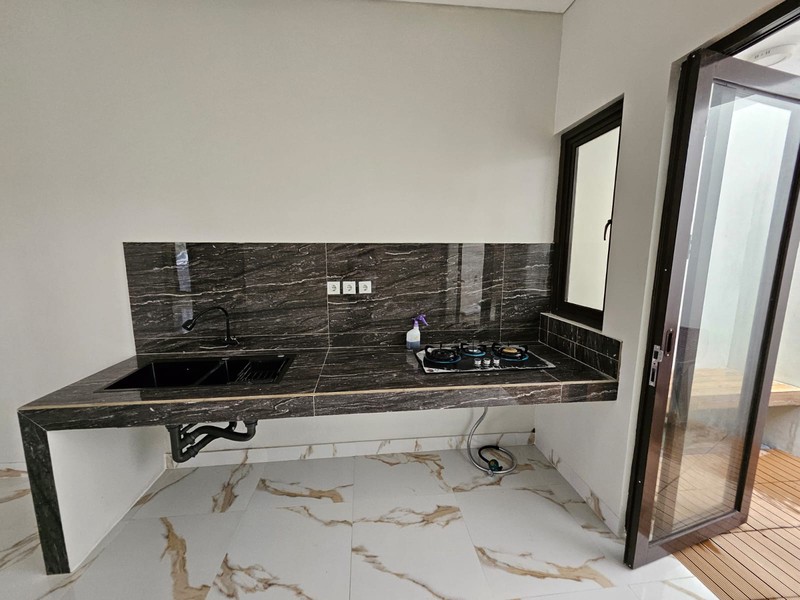 Rumah baru di Hoek kondisi siap huni di Cluster Champaca Residence, Rempoa