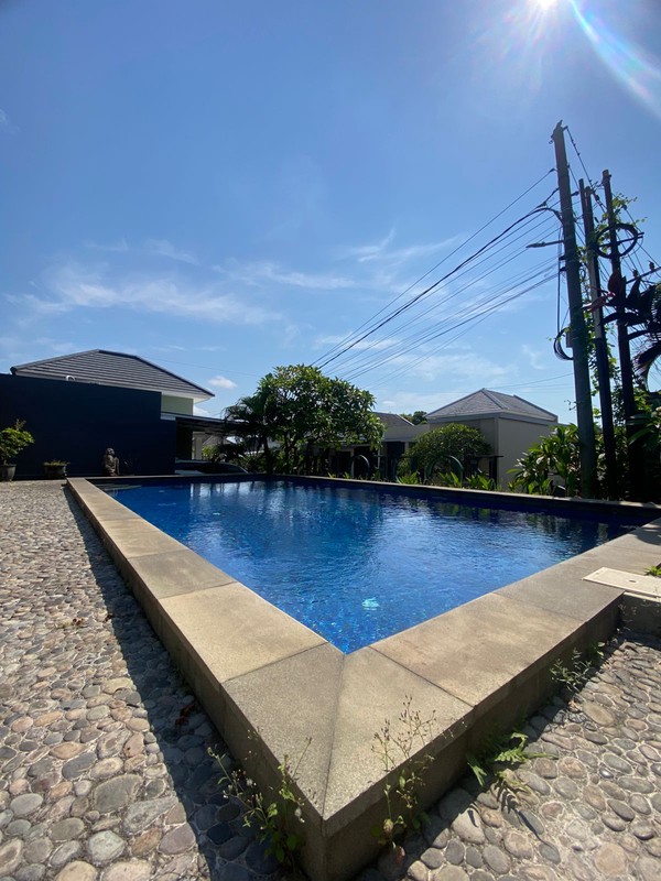 Beautiful Minimalist Fully Furnished House For Sale at Rodeo Hills Residence Jimbaran