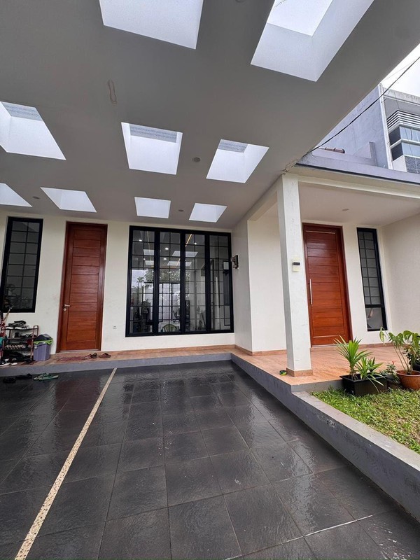 Rumah full renovasi konsep modern minimalis di Villa Melati Mas